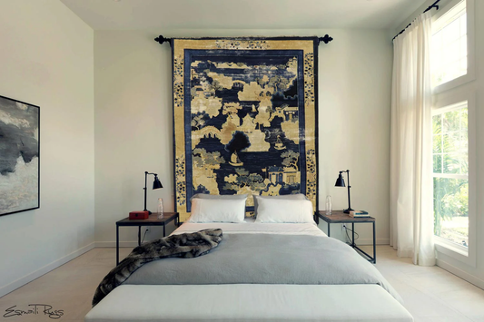 Contemporary bedroom décor with antique Chinese art deco wall tapestry