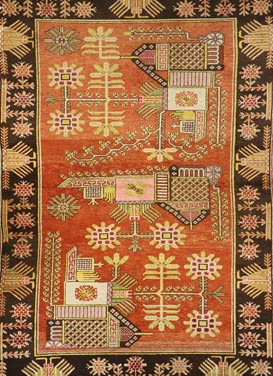 Antique orange and black Khotan rug