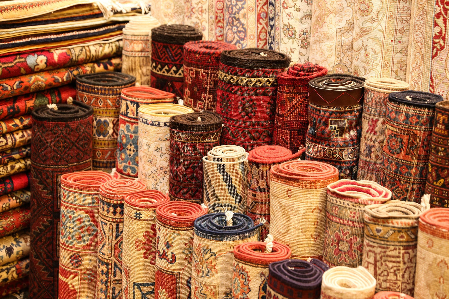 Esmaili Rugs showroom with various rugs