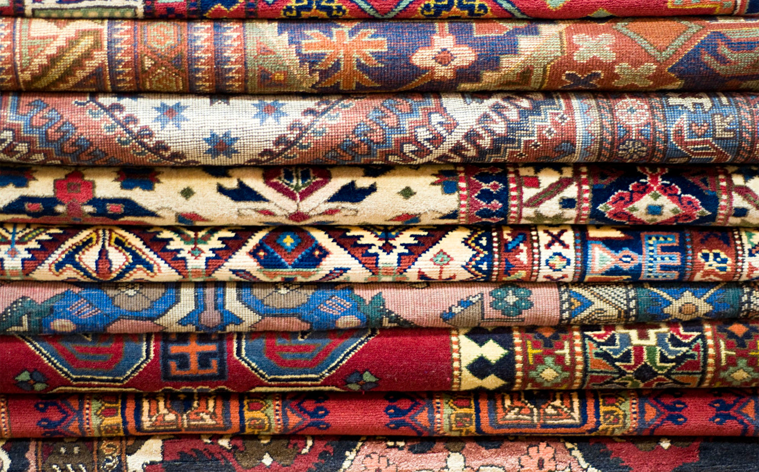 Stacked rugs available for rug consignment
