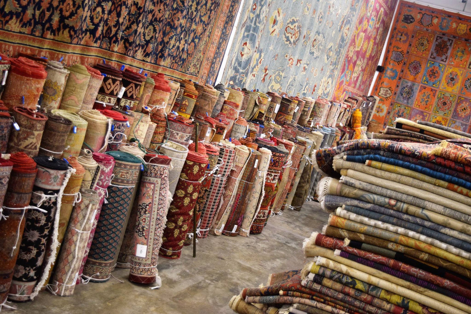 Various rugs in the Esmaili showroom